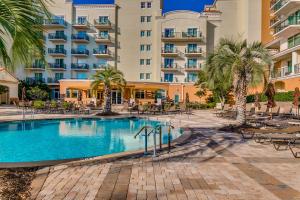 a swimming pool in front of a hotel at Marina Inn 4-303B in Myrtle Beach