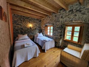 Postel nebo postele na pokoji v ubytování Hotel Rural LA CÁRCEL + 24 fotografií