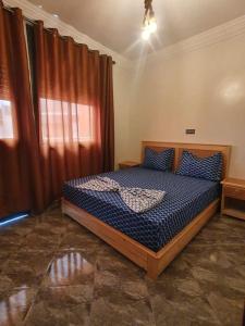 Una cama o camas en una habitación de Ayour Beach House 4