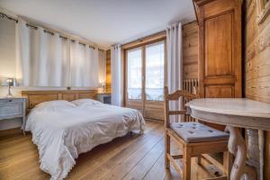 Posteľ alebo postele v izbe v ubytovaní Chalet Nessa + 37 fotografií