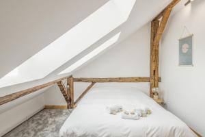 Posteľ alebo postele v izbe v ubytovaní Appartement Soffitta - Welkeys