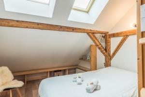 Posteľ alebo postele v izbe v ubytovaní Appartement Soffitta - Welkeys