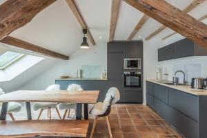Kuchyňa alebo kuchynka v ubytovaní Appartement Soffitta - Welkeys