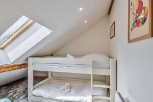 Posteľ alebo postele v izbe v ubytovaní Appartement Soffitta - Welkeys + 11 fotografií