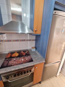 Kuchnia lub aneks kuchenny w obiekcie Chez Vida Vera Playa nudista