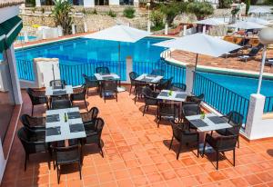 Reštaurácia alebo iné gastronomické zariadenie v ubytovaní Casalux One - Seaview - Outdoor Living - Pool - 5p