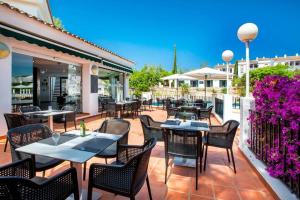 Reštaurácia alebo iné gastronomické zariadenie v ubytovaní Casalux One - Seaview - Outdoor Living - Pool - 5p