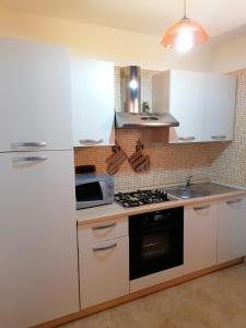 Η κουζίνα ή μικρή κουζίνα στο Casa Paola