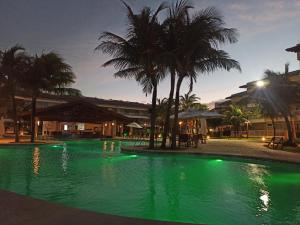 Swimmingpoolen hos eller tæt på Apartamento à Beira Mar Porto das Dunas - Paraiso das Dunas