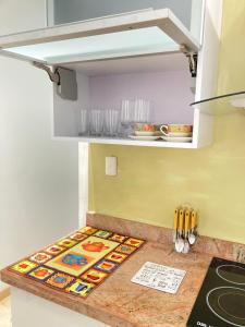 a kitchen counter with a rug on the counter at HATILLO SUITE in Caracas