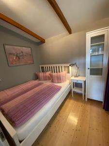 Letto o letti in una camera di Waldgasthaus Balsamine