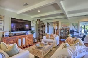 a living room with couches and a tv at Peaceful Ranch Resort and Vineyard View, Pool Access in Solvang