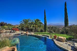 a swimming pool in a yard with trees at Peaceful Ranch Resort and Vineyard View, Pool Access in Solvang