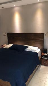 Postel nebo postele na pokoji v ubytování Airbnb prado1 evaristo