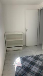 Cama o camas de una habitación en Aparto 1 dormitório São Paulo
