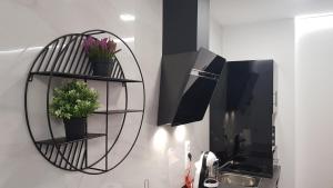 Apartamento Pepi Puerto (Adults Only)的电视和/或娱乐中心