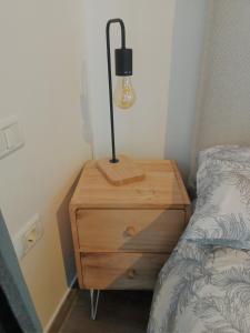 Łóżko lub łóżka w pokoju w obiekcie Apartamento MAYATA DELUXE