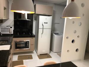 Η κουζίνα ή μικρή κουζίνα στο Aluguéis por temporada em Campina Grande +31 φωτογραφίες