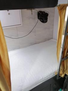 Krevet ili kreveti u jedinici u objektu Andheri-69-Dormitory