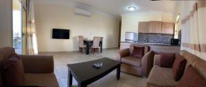 A kitchen or kitchenette at Bahga Palace 4 Residential Apartments