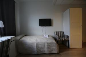 Postel nebo postele na pokoji v ubytování 100 Iceland Hotel