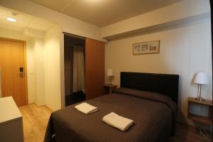 Postel nebo postele na pokoji v ubytování 100 Iceland Hotel