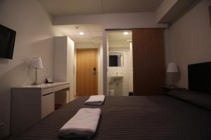 Postel nebo postele na pokoji v ubytování 100 Iceland Hotel