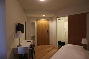 Postel nebo postele na pokoji v ubytování 100 Iceland Hotel