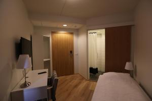 TV a/nebo společenská místnost v ubytování 100 Iceland Hotel