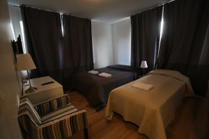 Postel nebo postele na pokoji v ubytování 100 Iceland Hotel