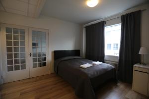Postel nebo postele na pokoji v ubytování 100 Iceland Hotel