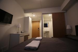 Postel nebo postele na pokoji v ubytování 100 Iceland Hotel