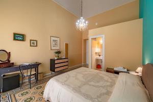 Posteľ alebo postele v izbe v ubytovaní B&B TOMMASO FAZELLO SCIACCA Residenza artistica