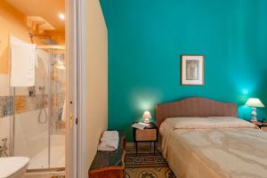 Posteľ alebo postele v izbe v ubytovaní B&B TOMMASO FAZELLO SCIACCA Residenza artistica