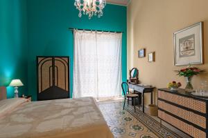 Posteľ alebo postele v izbe v ubytovaní B&B TOMMASO FAZELLO SCIACCA Residenza artistica