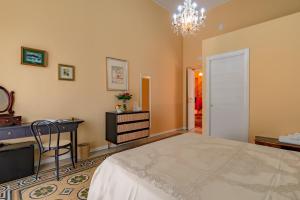 Posteľ alebo postele v izbe v ubytovaní B&B TOMMASO FAZELLO SCIACCA Residenza artistica