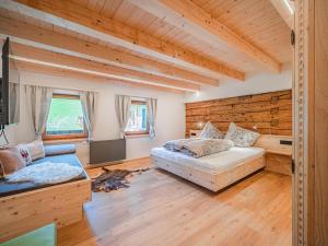 En eller flere senge i et værelse på Hohe Salve XL