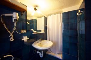 Koupelna v ubytování Hotel Dolonne