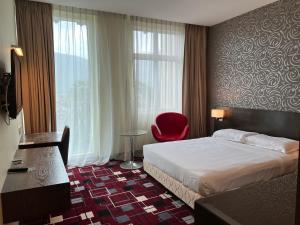 Voodi või voodid majutusasutuse SSL Traders Hotel toas