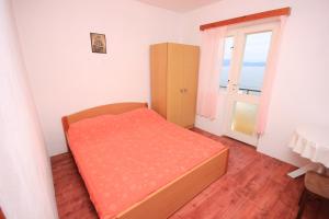 Posteľ alebo postele v izbe v ubytovaní Seaside secluded apartments Cove Torac, Hvar - 589