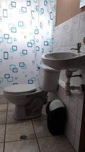 Een badkamer bij Hospedaje Santa Ana