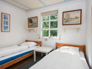 Postel nebo postele na pokoji v ubytování Holiday home Børkop LX