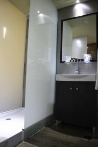 Koupelna v ubytování Hotel Vip Praia