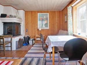 Posezení v ubytování 6 person holiday home in VAXHOLM-By Traum