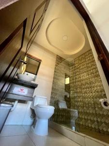 Kylpyhuone majoituspaikassa Hotel Wilson Anexo