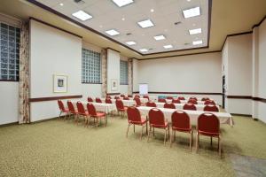 a conference room with a long table and chairs at Holiday Inn Express Hotel & Suites Portland-Northwest Downtown, an IHG Hotel in Portland
