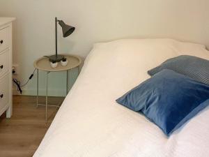 Postel nebo postele na pokoji v ubytování Holiday home HÄSTVEDA