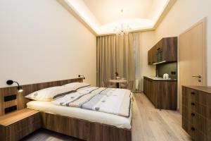 Cama o camas de una habitación en Ostrovni Astra Apartment