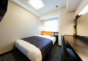 Lova arba lovos apgyvendinimo įstaigoje APA Hotel Midosuji Honmachi Ekihigashi