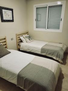 Кровать или кровати в номере Bella Vista